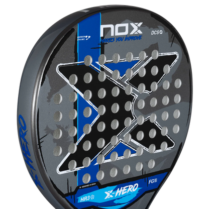 Nox X Hero Blue padel racket face close up showing surface texture and hole pattern, designed for beginner players