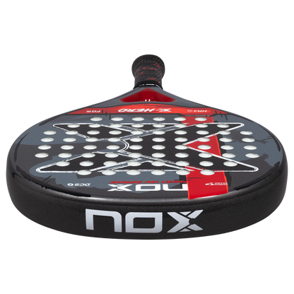 Nox X Hero Red padel racket bottom profile view showing frame thickness and edge design, designed for beginner players
