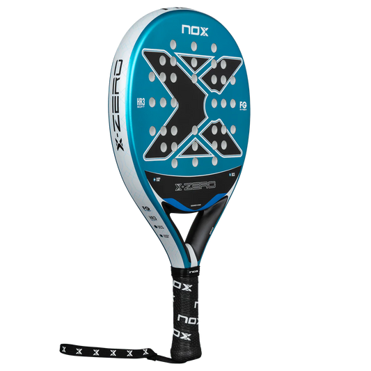 Nox X-Zero Blue 26 padel tennis racket for beginners, blue and black design with X graphic shown in alternate side angle on transparent background