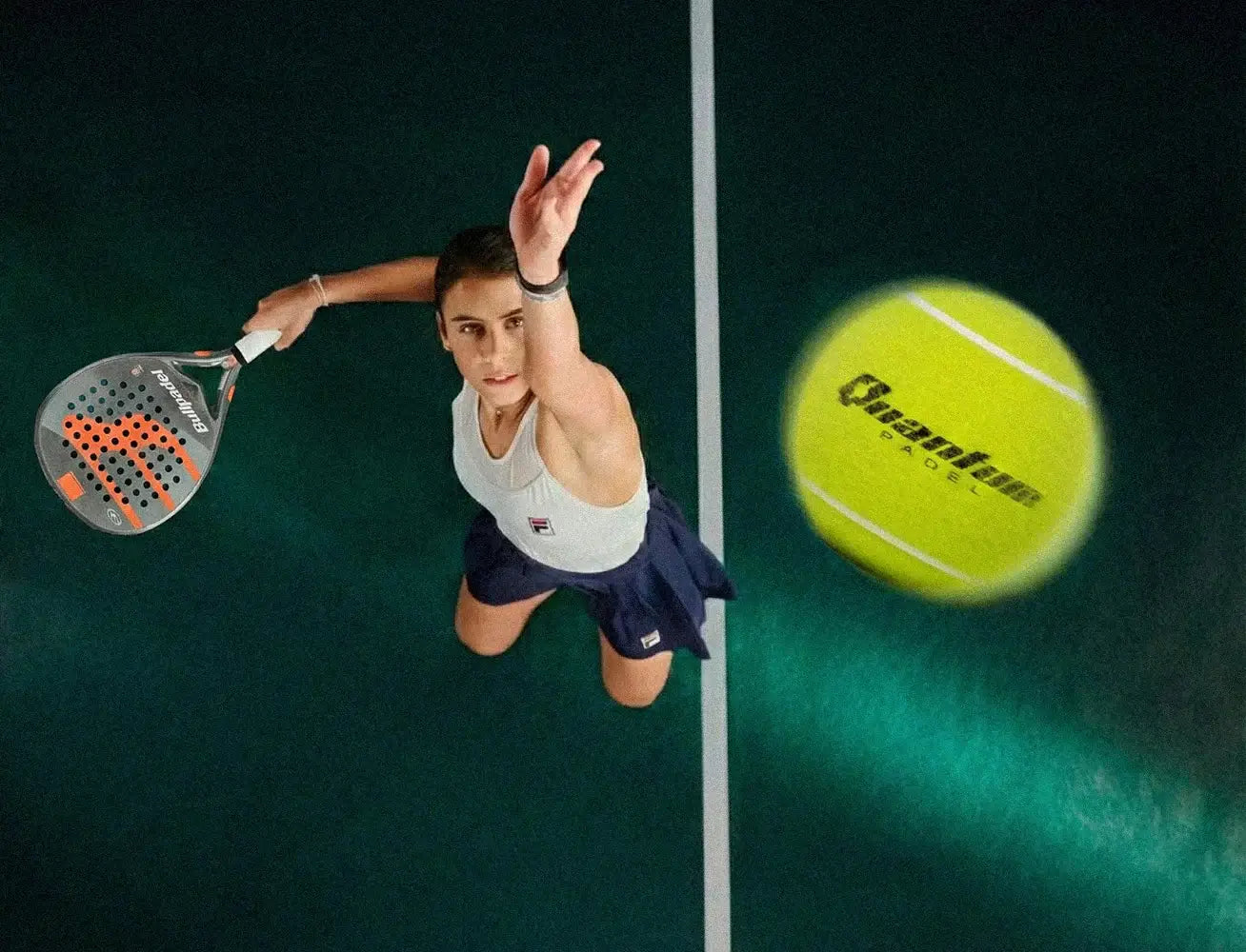 Player hitting a smash using Quantum Pro padel balls during competitive padel match