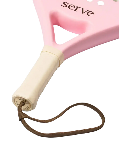 Serve womens padel racket handle close up showing grip and wrist strap detail, designed for women players