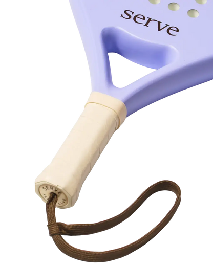 Serve womens padel racket handle close up showing grip and wrist strap, designed for women players