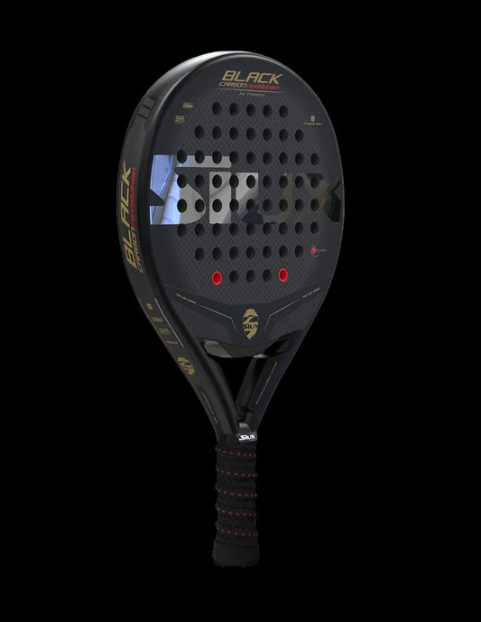 Siux black carbon revolution 3k padel racket angled view showing hole pattern and carbon finish designed.