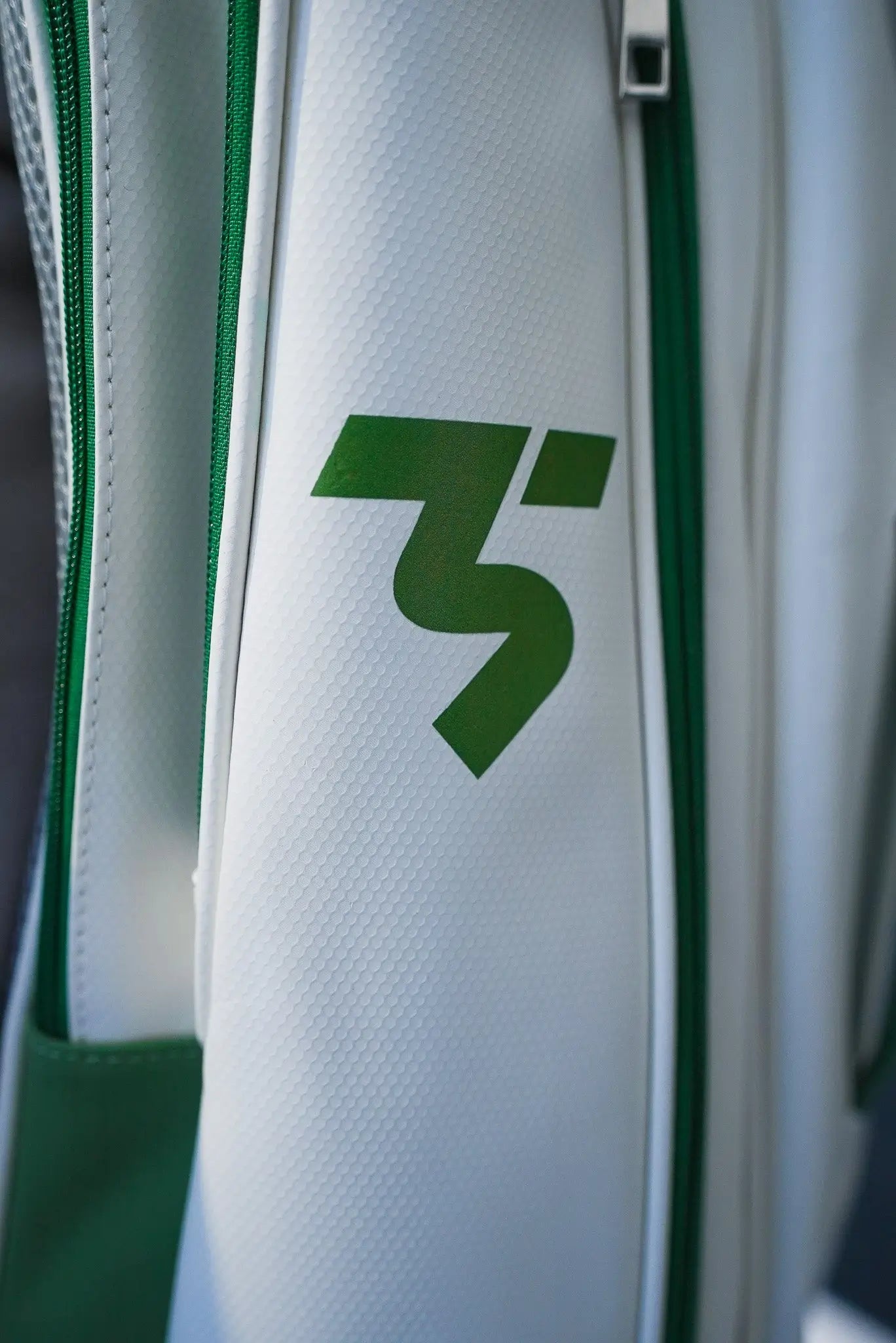 Third Shot game ready sports rucksack, close up of logo and textured PU material