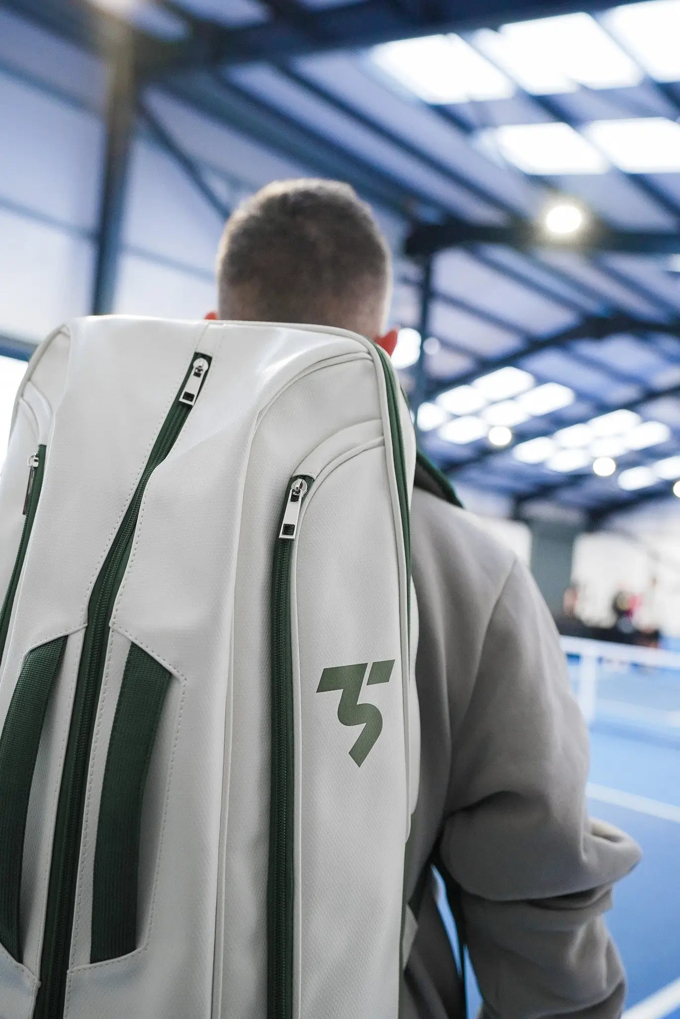 Third Shot game ready sports rucksack, rear lifestyle view showing zip compartments and ergonomic shape