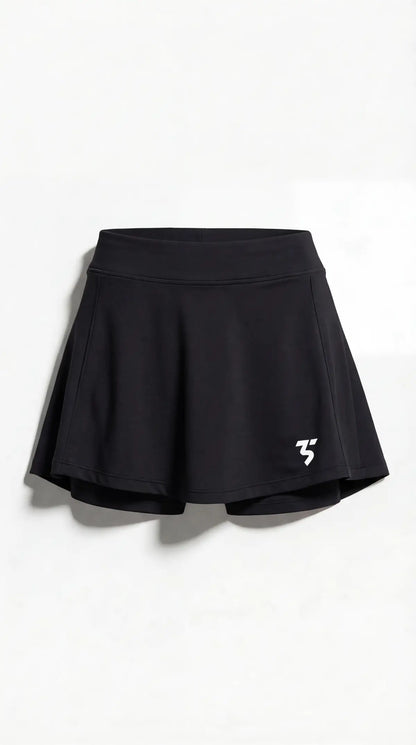 Third Shot women’s performance skort in black front view with integrated shorts, designed for all level players