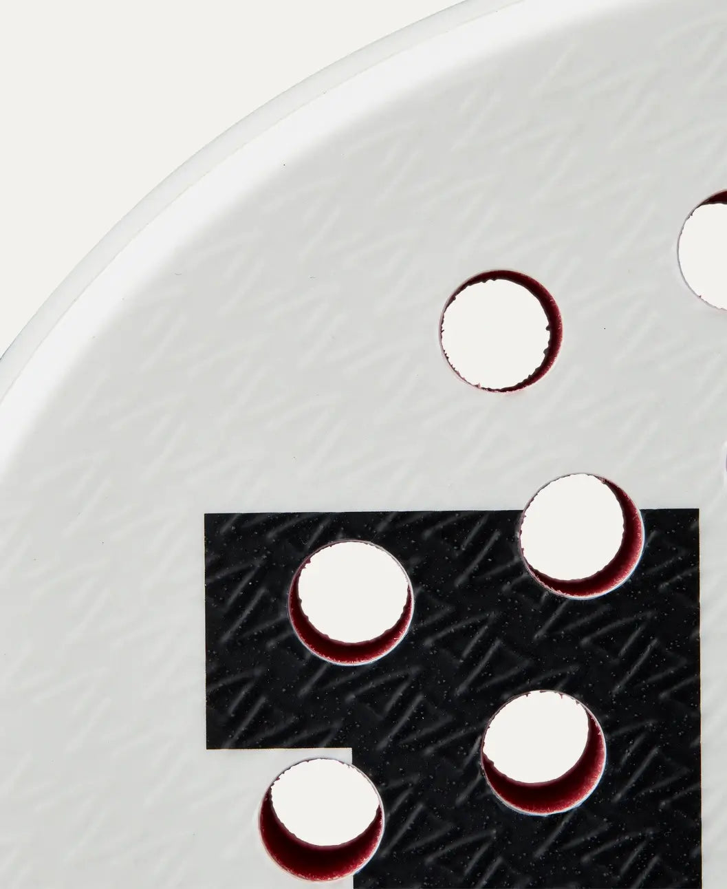 Wilson Bela LS V3 2025 padel racket close up face view showing textured surface and hole pattern, designed for intermediate players.