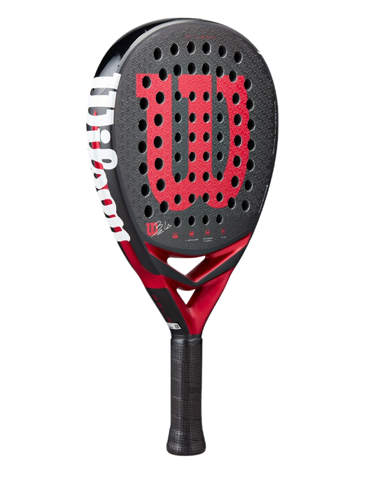 Angled view of the Wilson Bela V3 2025 padel racket showing the black textured surface, red Wilson logo and perforated holes, designed for advanced players.