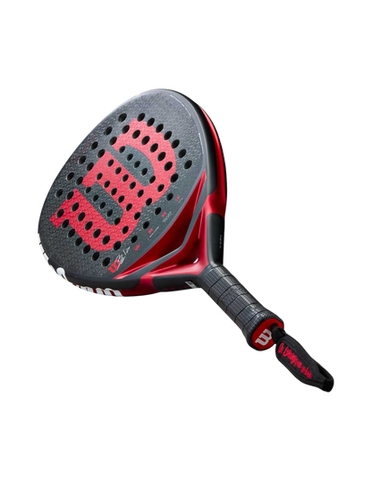 Angled view of the Wilson Bela V3 2025 padel racket in black with red Wilson branding and textured surface, designed for advanced players.