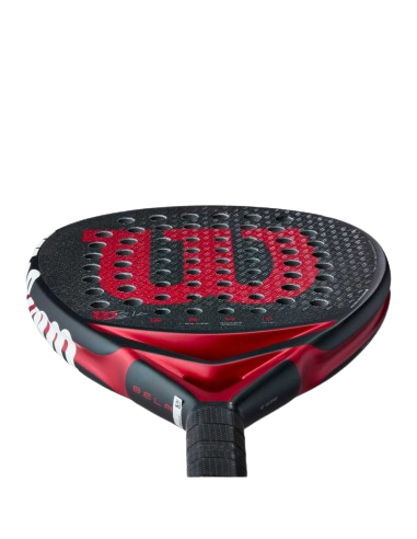 Angled close-up of the Wilson Bela V3 2025 padel racket head showing the black textured surface and red Wilson logo, designed for advanced players.