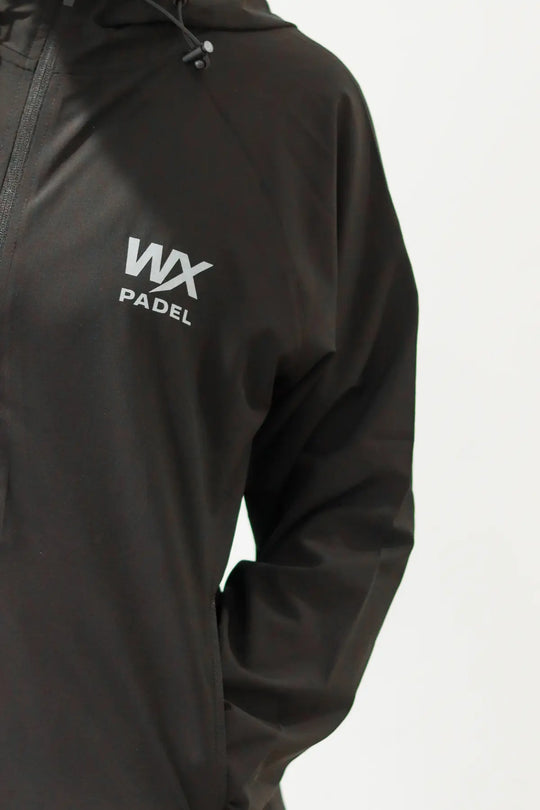 Grey WX Padel chest logo detail on the black Performance Division Technical Full-Zip Hoodie