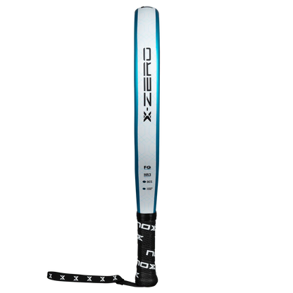 Nox X-Zero Blue 26 padel tennis racket for beginners, slim side profile view showing X-Zero branding on transparent background.