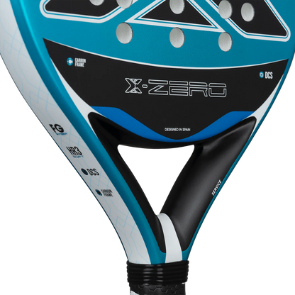 Nox X-Zero Blue 26 padel tennis racket for beginners, slim side profile showing X-Zero branding and black NOX grip on transparent background